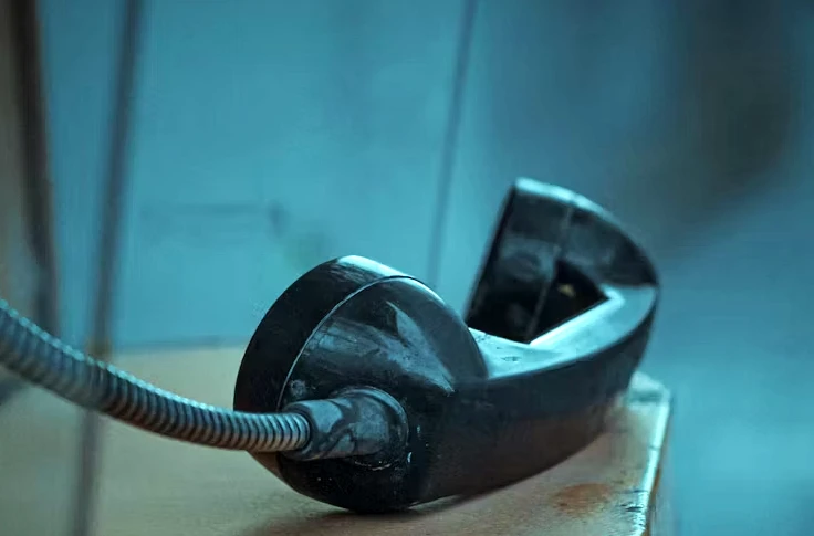 Old pay phone off the hook